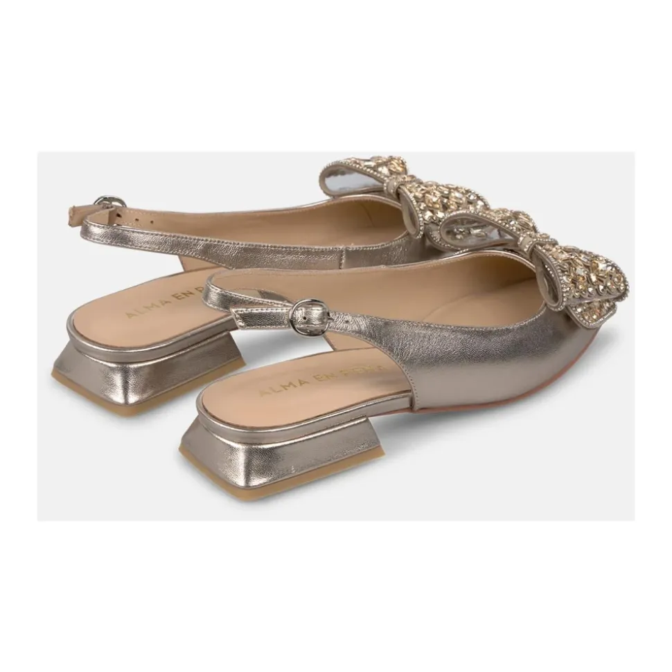 Płaskie buty z kokardką