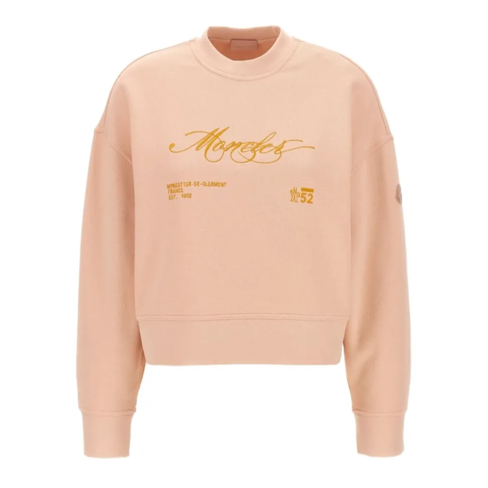 Różowy sweter z haftowanym logo