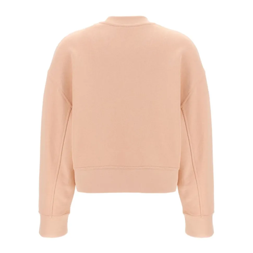 Różowy sweter z haftowanym logo