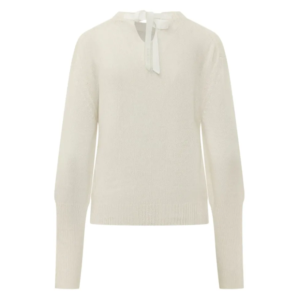 Sweter z detalami w kształcie węzła
